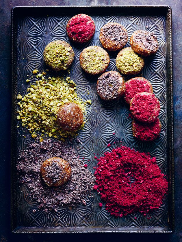 assorted pastries on a metal tray with sprinkles