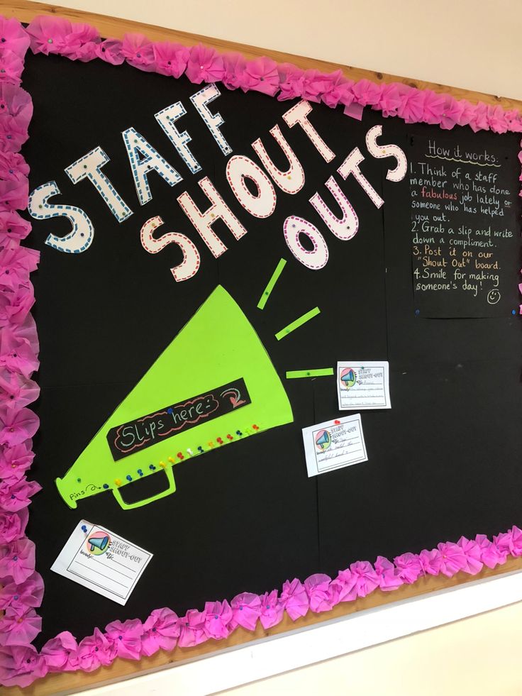 a bulletin board with pink flowers and writing on it that says staff shuts out