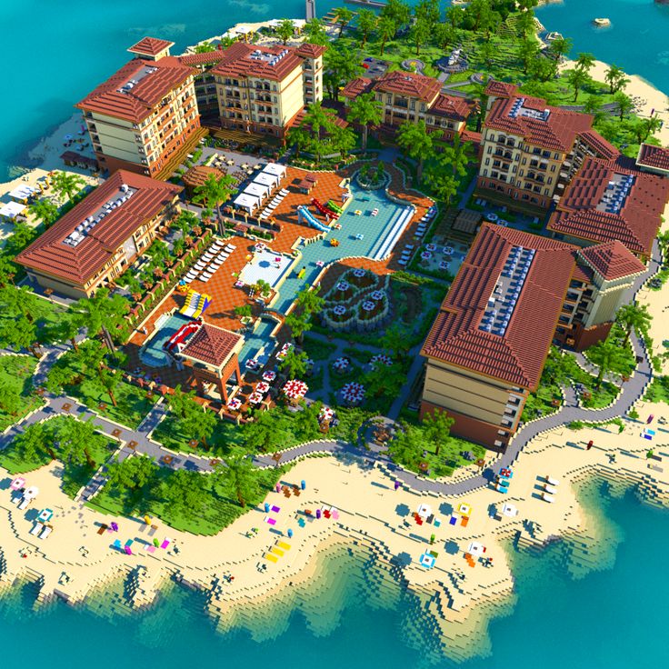 an aerial view of a resort on the beach with many rooms and bathrooms in it