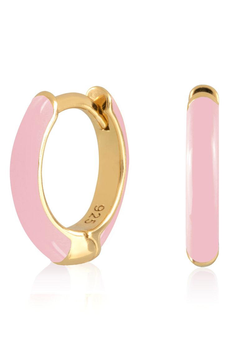 Easy-to-wear hoop earrings will add significant polish to even your most casual ensembles. 1/2" drop; 1/8" width Hinge with snap-post closure Sterling silver with goldtone plate/enamel Imported Enamel Huggie Earrings Perfect For Gifts, Pink Enamel Hoop Jewelry, Trendy Enamel Hoop Jewelry, Trendy Enamel Huggie Earrings, Pink Enamel Hoop Earrings, Gold Enamel Huggie Earrings, Everyday Enamel Hoop Earrings, Enamel Huggie Hoop Earrings For Pierced Ears, Gold Enamel Hoop Huggie Earrings