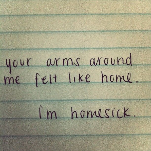 a piece of paper with writing on it that says, your arms around me felt like home i'm homesick