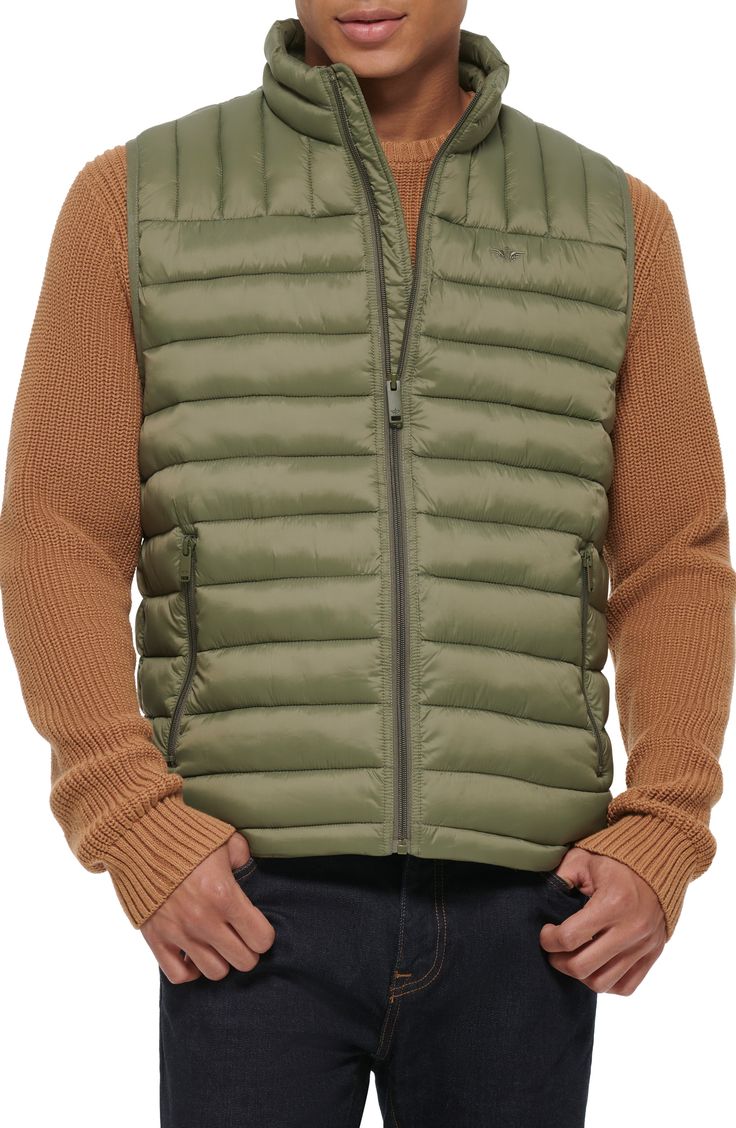 A quilted stand collar and lightweight fill insulate this heat-keeping puffer vest. 26 1/2" length (size Medium) Stand collar Front zip closure Front zip pockets Water resistant 100% nylon Machine wash, tumble dry Imported Spring Quilted Puffer Jacket For Outdoor Activities, Casual Nylon Puffer Jacket With Zipper Closure, Casual Nylon Puffer Jacket With Zipper, Solid Color Quilted Puffer Jacket, Functional Spring Puffer Jacket For Outdoor Activities, Spring Functional Puffer Jacket For Outdoor Activities, Spring Outdoor Puffer Vest, Spring Outdoor Nylon Vest, Casual Nylon Vest With Zipper Closure