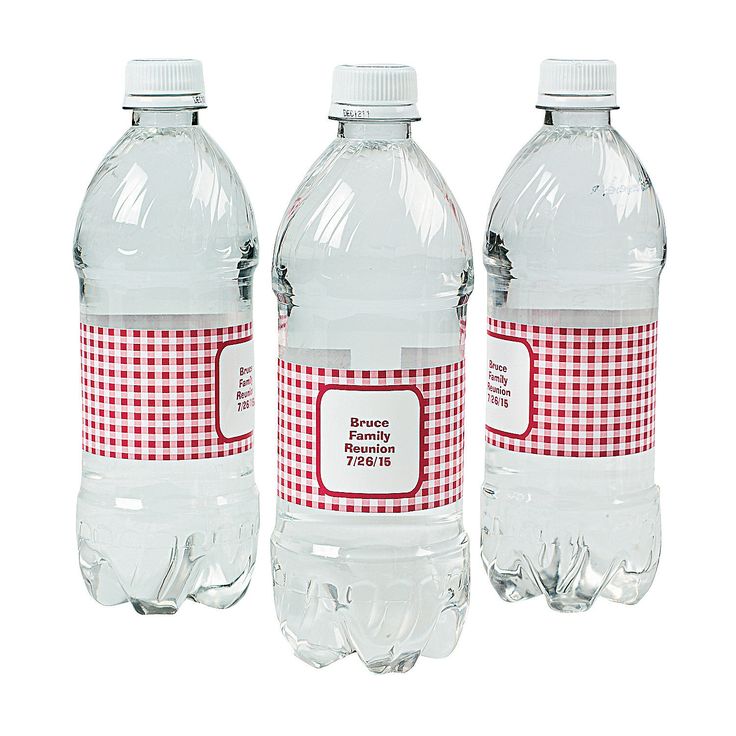 three bottled water bottles with labels on them