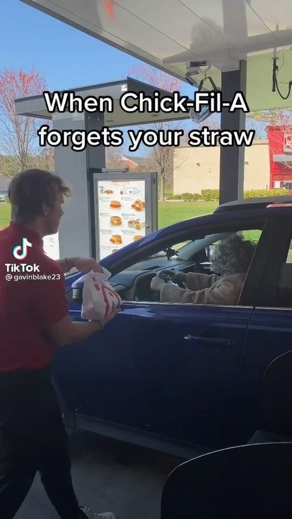 a man walking past a car at a gas station with the caption when chick - fil - a forgets your straw