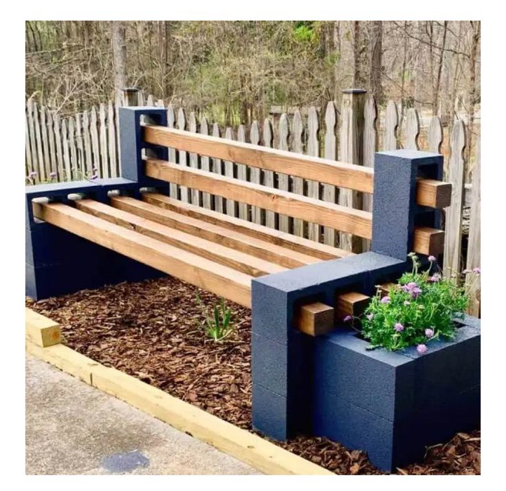 a wooden bench with plants growing in it