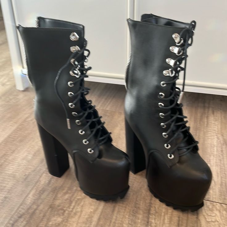 5 3/4" Heel With 3" Platform. Front Laces And Back Zipper. Excellent Condition Never Worn. High Heel Combat Boots, Heel Combat Boots, Black High Heels, Gothic Fashion, Lace Front, High Heel, Combat Boots, Heeled Boots, High Heels