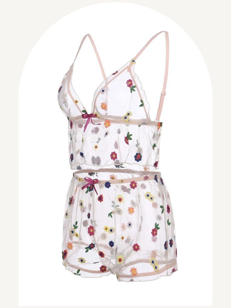 This flower embroidered mesh pajama set features a sexy camisole and see-through shorts for a bold and alluring look. Perfect for a romantic evening or comfortable lounging. Lace Sleepwear With Floral Print For Loungewear, Summer Floral Print Pajama Shorts For Sleepovers, Spring Floral Embroidered Sleepwear For Loungewear, Summer Sleep Camisole Sets, Spring Bedtime Camisole Set, Lace Sleepwear For Summer, Summer Sleepwear Cami Set, Spring Pajama Party Short Set, Lace Sleepwear For Summer Sleepovers