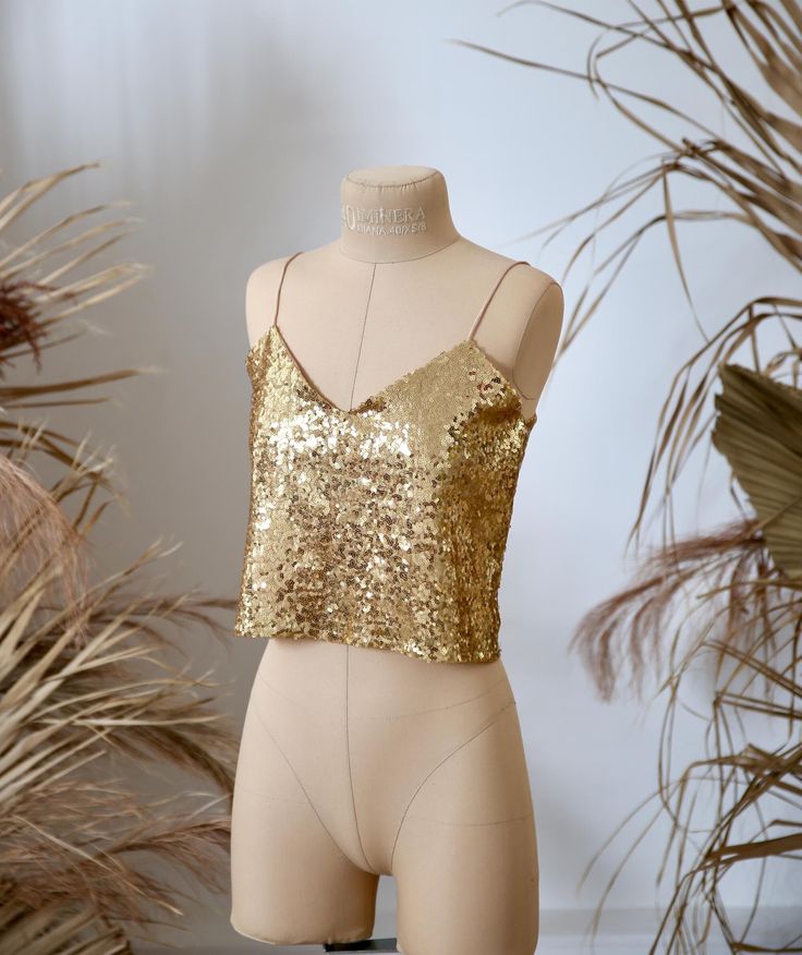 Ready to ship item, no need to waiting for production, can ship today! Description: Item Number #1371 Sequin top Thin straps  Bust circumference: XS - 83 cm chest (33 in) Total length: 43 cm (17 in) Color - Gold  "CONFETTI" SEQUIN TOP  Gentle luxury handmade sequin blouse. Beautiful neckline on the back. Perfect silk lining.  Perfectly combined with tulle or any high waist skirts.  Amazing sequin blouse for bridesmaids or any party. Your bridesmaids will be stunning! Lining: Italian silk satin s New Years Eve Tops, Gold Crop Top, Party Crop Tops, Sequined Top, Nye Outfits, Sequin Blouse, Cropped Tops, Gold Top, Buy Fabric