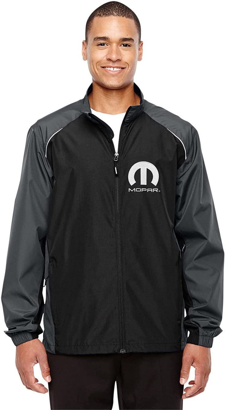 This men's MOPAR lightweight windbreaker jacket has been crafted for quality and comfort. It's styling was adapted to ensure the wearer of fashion and comfort. This men's lightweight hiking jacket is beautifully tailored with a wind resistant and water resistant shell made of 100% Nylon. Zip front jacket from bottom to collar top. Inside adjustable draw cord with cord lock at the bottom. Plenty of storage with 2 hand pockets with zippers for security Elastic sleeve cuffs. Partial inside placket Mustang Jacket, Masculine Shirts, Mustang T Shirts, Twill Coat, Corvette C7, Water Resistant Jacket, Hiking Jacket, Heavy Jacket, Navy Jacket