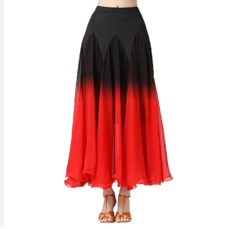 a woman wearing a skirt with red and black ombrettas on the bottom