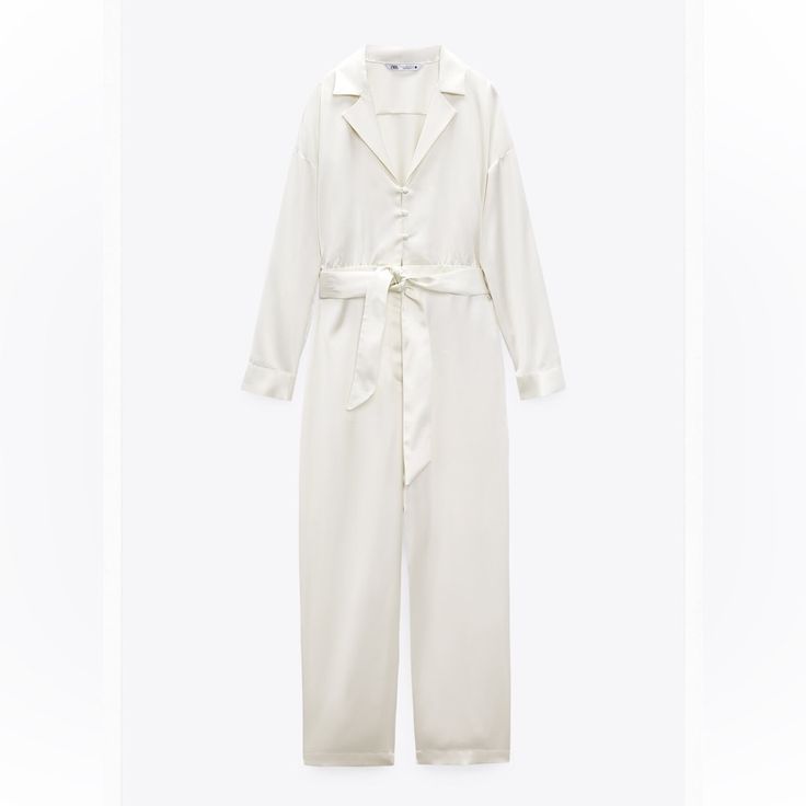 Nwt Zara Satin Jumpsuit With Belt, Cream Color, Size Small Brand New With Tags, Sold Out Style! Long Sleeve Jumpsuit With V-Neck Lapel Collar. Self Belt. Wide Leg. Front Zip, Metal Hook And Tonal Lined Button Closure. White Long-sleeve Summer Pantsuit, White Long Sleeve Summer Pantsuit, White Long Sleeve Pantsuit For Summer, White Overall Jumpsuits And Rompers For Loungewear, White Long Sleeve Jumpsuits And Rompers For Work, White Long Sleeve Jumpsuit For Work, Elegant Long Sleeve Jumpsuits And Rompers By Zara, Zara White Overall Jumpsuits And Rompers, Fitted White Zara Jumpsuit And Romper