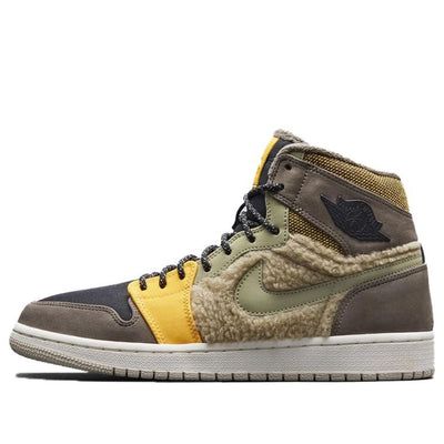 The women’s Air Jordan 1 Retro ‘Utility Pack’ is a winterized version of the classic basketball sneaker. It features a combination of brown hues on the leather and buck paneling with contrasting yellow accents on the toe, tongue and ankle. The quarter panel is also layered with a Sherpa fleece application. This sneaker is perfect for the winter months and will keep you comfortable and stylish at the same time. (AJ1/SNKR/Women's) Wmns Air Jordan 1, Yellow Accents, Air Jordan 1 High, Basketball Sneakers, Air Jordan 1 Retro, Jordan 1 Retro, Winter Months, Sherpa Fleece, Air Jordan 1