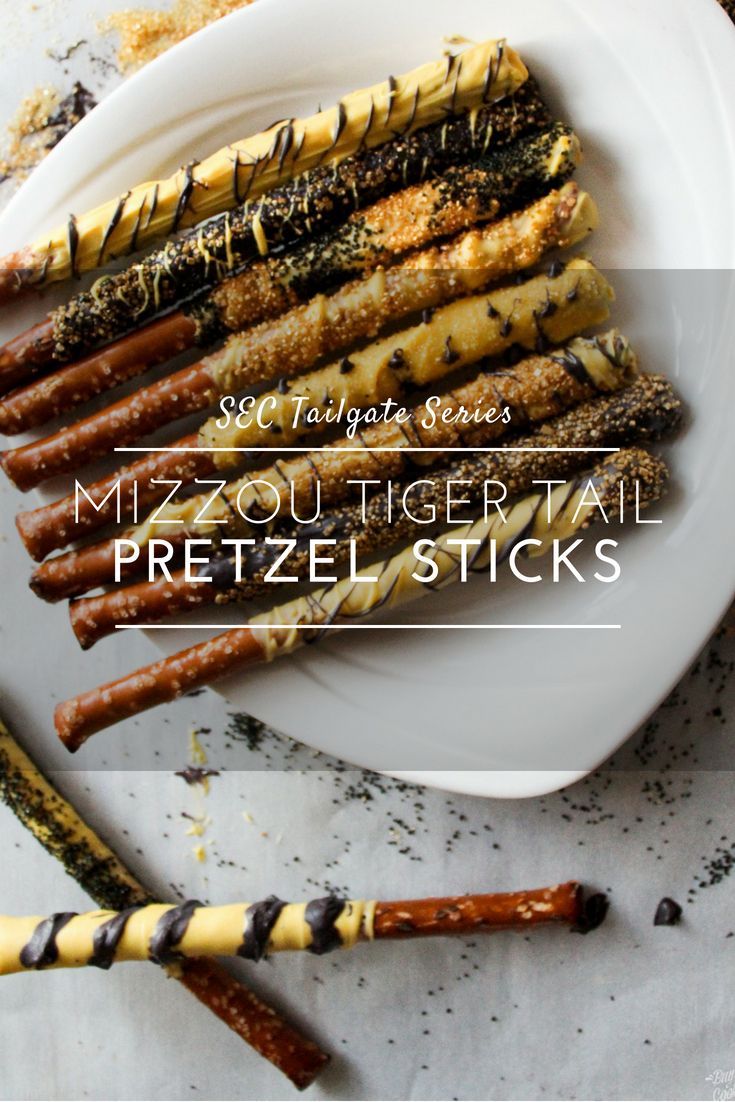 several different types of pretzel sticks on a white plate with the words mizou tiger tail pretzel sticks