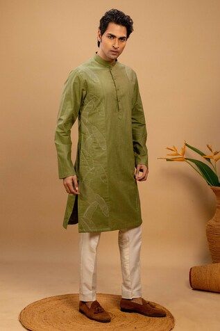 Green kurta with quilted embroidery on left and right side. Paired with a cotton silk churidar. - Aza Fashions Festive Cotton Sherwani With Floral Embroidery, Ceremonial Cotton Sherwani With Cutdana, Fitted Cotton Silk Kurta For Ceremonial Occasions, Ceremonial Cotton Silk Fitted Kurta, Cotton Sherwani With Floral Embroidery For Diwali, Designer Cotton Sherwani, Cotton Churidar With Floral Embroidery And Traditional Drape, Designer Green Cotton Sherwani, Transitional Long Sleeve Cotton Churidar