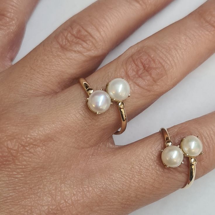 Engagement Gold ring, 14k Gold ring, Gold ring with pearl, ivory pearl gold ring, bridal pearl ring, bridesmaid gift This Shell handmade Gold ring with Pearl is made of 14K genuine gold and set with Natural Pearl. This Stunning Ring is set with Best AAA+ Quality Natural Pearl set in 14k Yellow Gold. High end finish with easy touch of diamond cut. This 14k Gold ring can serve as an engagement ring or a birthday gift. All colors at the picture are available. * Gemstone -6mm Round Natural Pearl. * Classic 14k Gold Toe Ring, Dainty 14k Gold Bypass Promise Ring, 14k Gold Bypass Open Ring For Promises, Elegant 14k Gold Open Band Couple Rings, Dainty Bypass Ring For Anniversary, Elegant Hallmarked Open Couple Rings, Elegant 14k Gold Open Couple Rings, Elegant Adjustable Stackable Rings Stamped 14k, 14k Gold Pearl Promise Ring