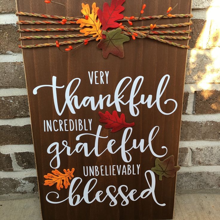 a wooden sign that says very grateful incredibly grateful unbelevably blessedly decorated