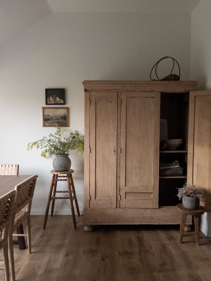 Dining Table Cabinet, Nook Dining Table, Kitchen Armoire, Diy Framed Wall Art, Nook Dining, Armoire Cabinet, Farmhouse Stools, Pantry Wall, Antique Armoire