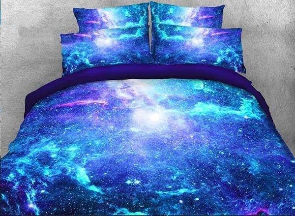 a bed covered in blue and purple galaxy comforter sets with pillows on top of it