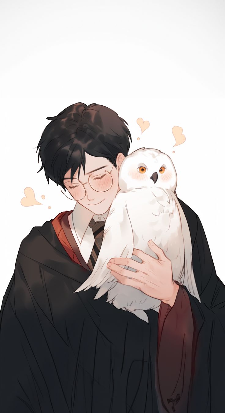 a man holding an owl in his arms