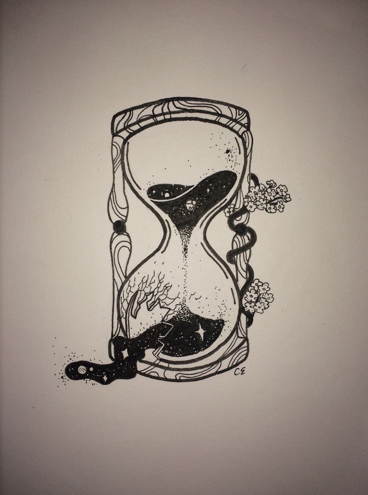 an hourglass with flowers on it and a key in the bottom right hand corner