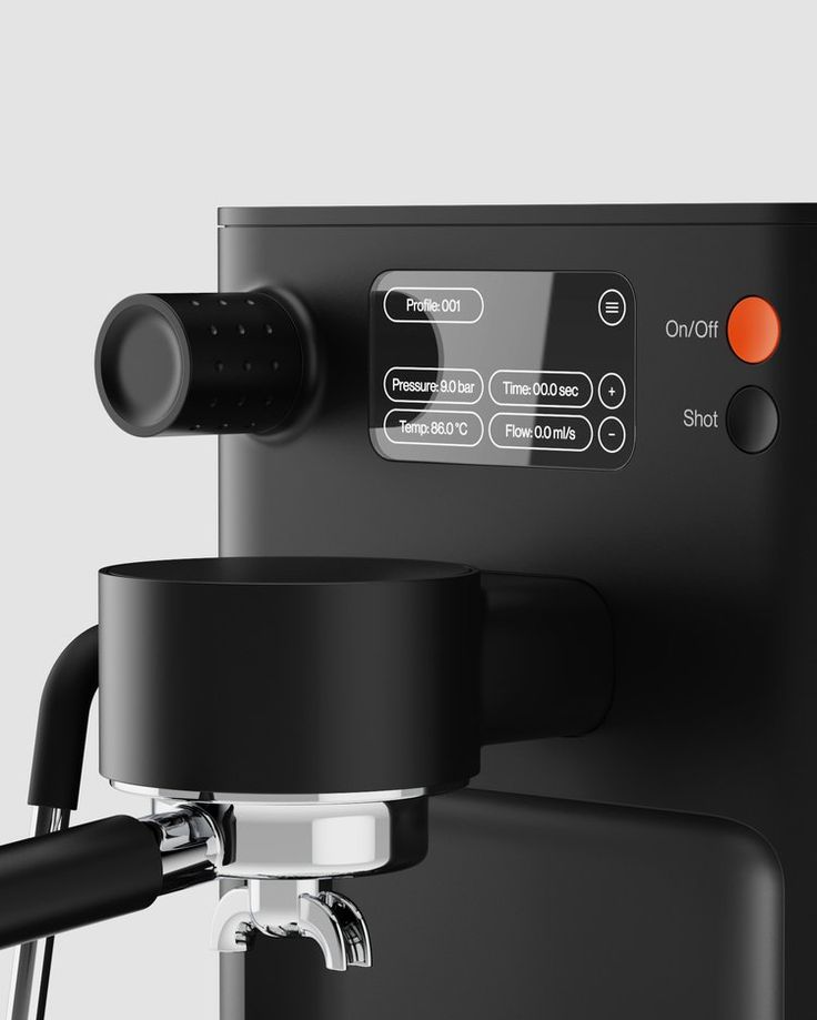 an espresso machine is shown with the control panel on it's side