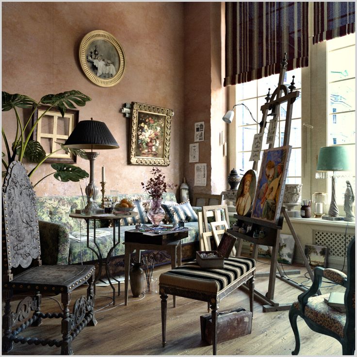 a living room filled with lots of furniture and paintings on the wall next to a window