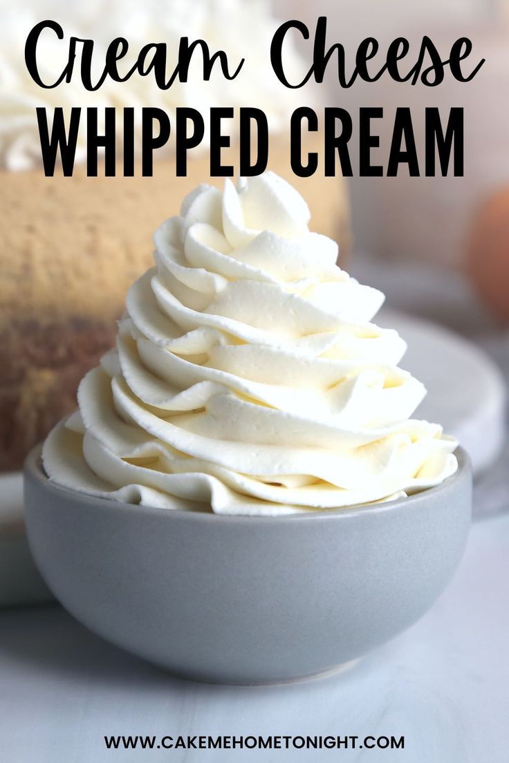 a bowl filled with whipped cream on top of a table