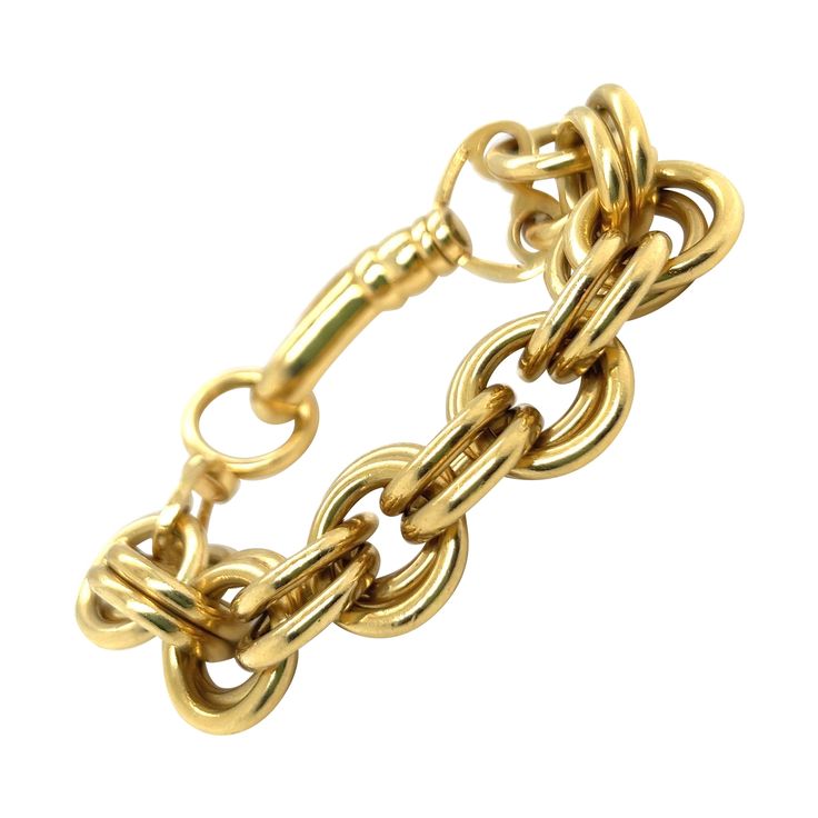 Stylish Tiffany & Co. Schlumberger Bull Swivel Bracelet in 18 karat yellow gold. Crafted in 18 karat yellow gold and designed as 11 double ring links with a large lobster clasp. The bold gold links add dimension to this elegant chain bracelet. Jean Schlumberger (1907 – 1987) was a French jewelry designer especially well known for his work at Tiffany & Co. His visionary creations are among the world’s most intricate designs. This wonderful jewel has been recently professionally cleaned and is in very good condition. Signed Tiffany & Co, Schlumberger Length of the bracelet: circa 19 cm / 7.5 in Assay mark: 750 This bracelet currently retails for 32'700 EUR at Tiffany & Co. Jean Schlumberger, Tiffany And Co Bracelet, 18k Gold Bracelet, Diana Vreeland, Elsa Schiaparelli, French Jewelry, Double Ring, Tiffany And Co, Yellow Gold Bracelet