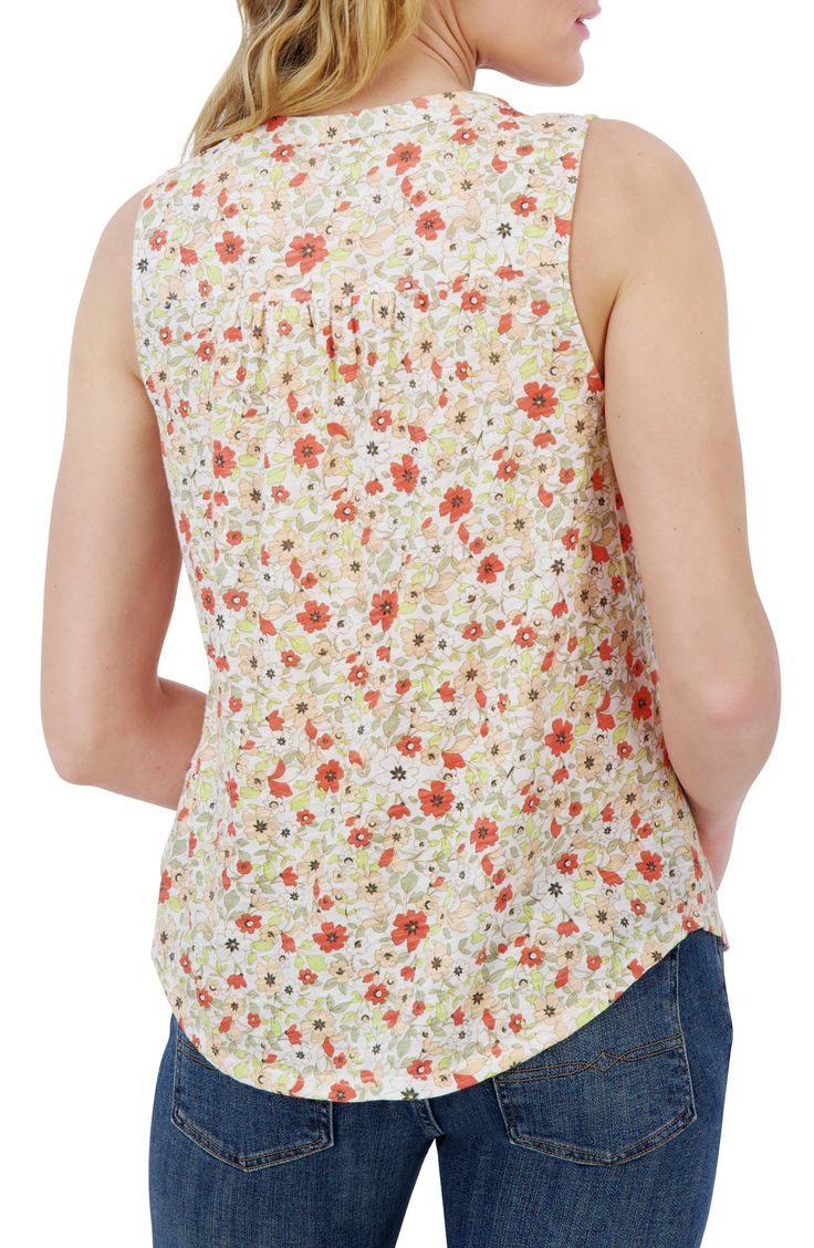 Dainty flowers blossom along a sleeveless tank styled with a smocked notched collar. Notched collar Sleeveless 60% cotton, 40% polyester Machine wash, tumble dry Imported Spring Camisole With Smocked Back, Spring Camisole Tank Top With Smocked Back, Spring Cami Tank Top With Smocked Back, Spring Smocked Back Cami Tank Top, Spring Floral Print V-neck Smocked Top, Blossom Flower, Sleeveless Tank, Lucky Brand, Smocking