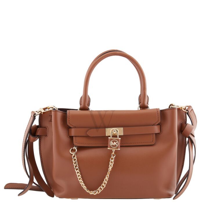 Michael Kors Ladies Satchel. SKU: 30F1G9HS1L-230. Barcode: 194900728154. Color: Luggage. Size: 12.5"W x 7.5"H x 4.75"D. Michael Kors Ladies Luggage Hamilton Legacy Small Leather Belted Satchel. The Hamilton satchel is crafted from smooth leather with a gold-tone hardware. It features a snap fastening, center zip compartment, 4.5" handle drop and adjustable side gussets. Michael Kors Luggage, Swiss Military, Ice Watch, Bruno Magli, Versace Watch, Denim Shoes, Crossbody Messenger Bag, Small Handbags, Handbag Backpack