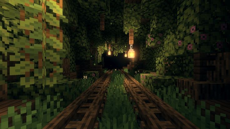 an image of a minecraft tunnel with lots of green plants and trees in it