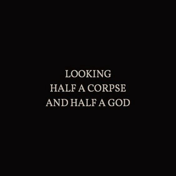 the words looking half a corpse and half a god are shown in white on a black background