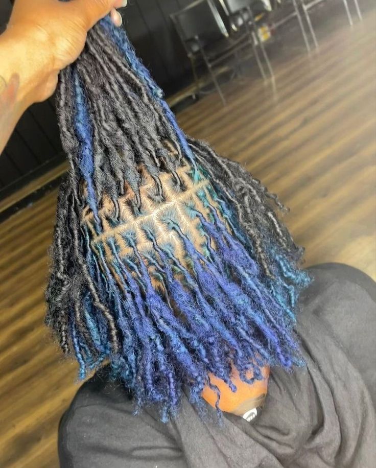 Blue Roots Black Hair Locs, Colors To Dye Your Locs Black Women, Loc Inspo Black Women Color, Blue Peekaboo Locs, Black And Blue Dreads, Navy Blue Locs, Skunk Stripe Dread Locs, Black And Blue Locs, Blue Black Locs