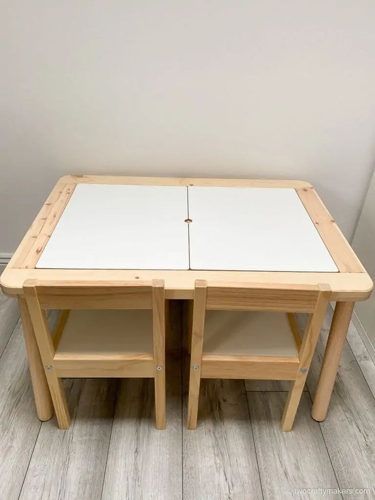 two wooden tables sitting on top of a hard wood floor