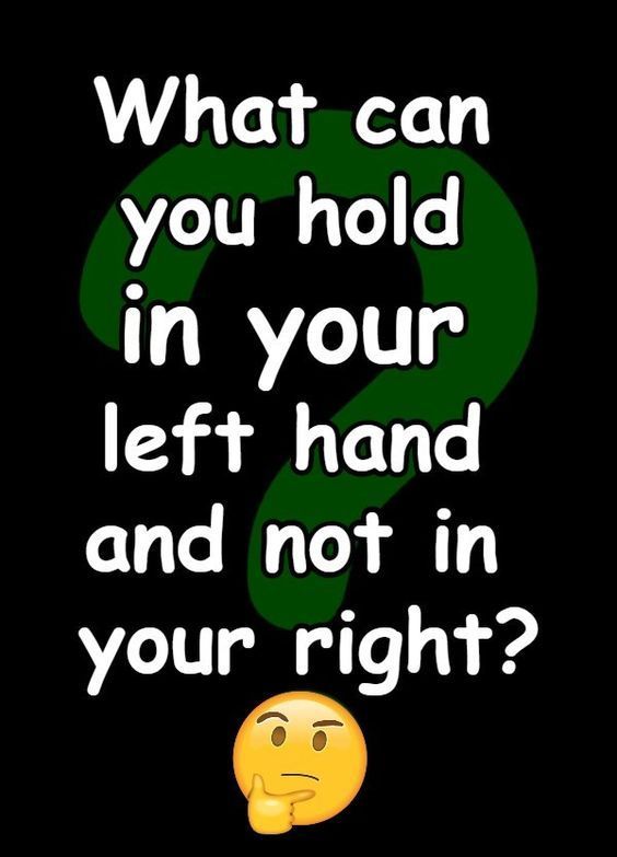 a black background with a green question mark and the words what can you hold in your left hand and not in your right?