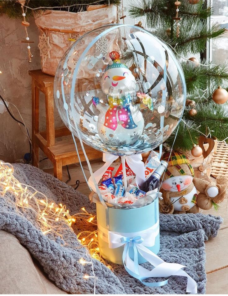 a snow globe filled with lots of candy