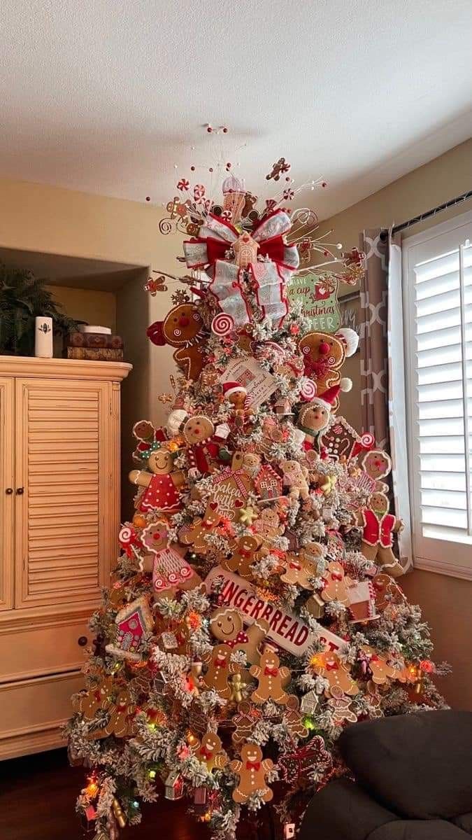 a christmas tree decorated with candy canes and candies is in the living room