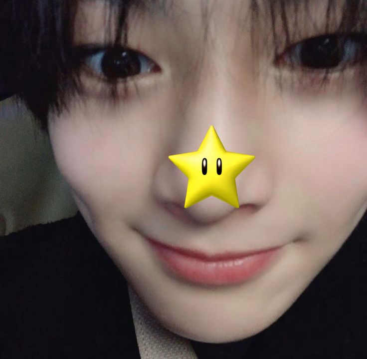 a person with a yellow star on their nose