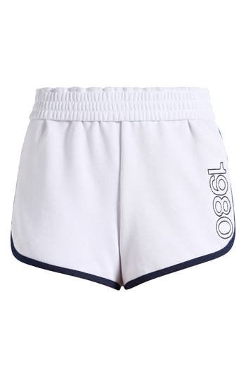 Work out or chill out in these sporty French terry shorts designed with an elastic waistband and contrasting trim. Elastic waist 60% cotton, 40% polyester Machine wash, line dry Imported White Stretch Bottoms With Logo Waistband, Summer Loungewear Bottoms With Logo Waistband, White Athletic Shorts With Elastic Waistband For Leisure, White Shorts With Comfort Waistband, Sporty White Leisure Shorts, White Sporty Shorts For Loungewear, Sporty White Shorts For Loungewear, White Shorts With Ribbed Waistband, Sports Bottoms With Contrast Trim