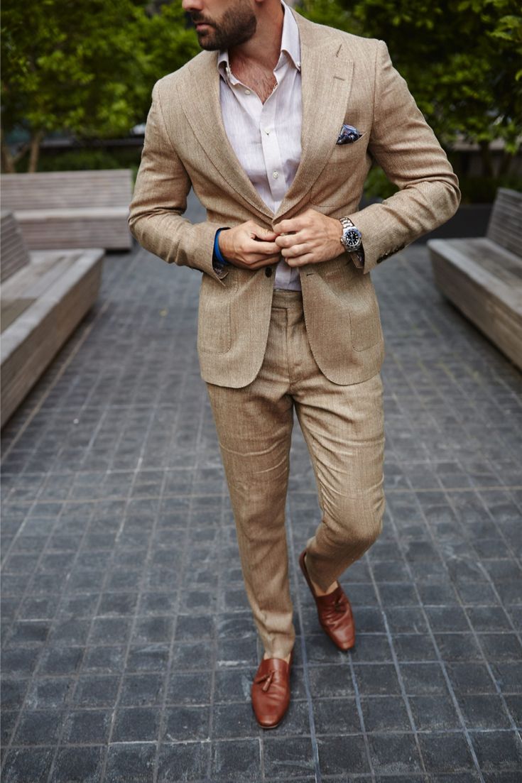 Men��’s formal attire, featuring a custom tailored neutral colored suit. Accessorized with a pair of brown slip on loafters with a light linen buttned shirt. Mens Tan Suit, Tan Suit Wedding, Mens Formal Fashion, Nude Shirt, Business Attire For Men, Tan Suit, Formal Fashion, Mens Haircut, Linen Men