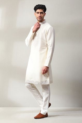 Ivory full sleeve kurta with thread, mirror embroidrery in paisley pattern. Paired with pant. - Aza Fashions White Embroidered Sherwani For Eid, Eid White Sherwani With Embroidered Border, Eid White Embroidered Sherwani, Off White Long Sleeve Sets With Embroidered Border, Off-white Long Sleeve Kurta With Dabka, Festive White Sherwani With Embroidered Border, Fitted White Sherwani With Embroidered Border, Off White Long Sleeve Traditional Wear With Dabka Work, White Sherwani With Embroidered Border For Wedding