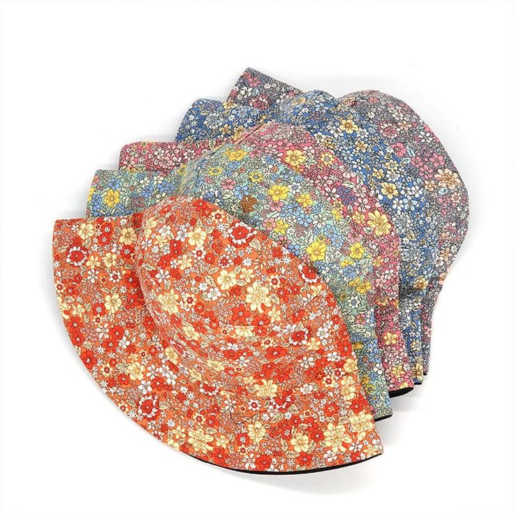 This sun-ready bucket hat comes in a soft fabrication and structured-style with a floral pattern, flat-top, and flared brim, making it a summer favorite silhouette. Specs: Floral pattern Two-sided Material: Cotton, Polyester Size: 56-58cm/22.1"-22.8" Spring Multicolor Sun Hat With Flat Brim, Multicolor Curved Brim Bucket Hat For Summer, Multicolor Summer Hat For Garden Party, Multicolor Curved Brim Bucket Hat For Spring, Multicolor Flat Brim Bucket Hat For Summer, Spring Multicolor Curved Brim Bucket Hat, Multicolor Sun Hat For Summer Garden Party, Multicolor Short Brim Bucket Hat For Spring, Multicolor Bucket Hat For Spring