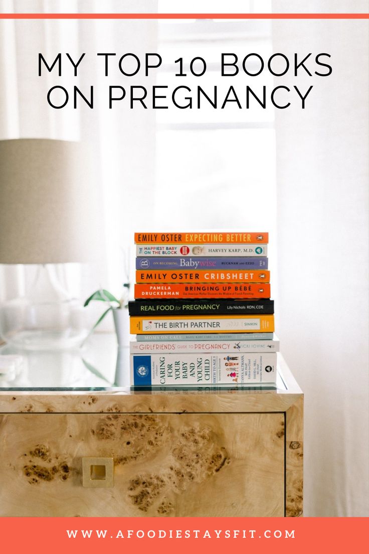 books stacked on top of each other with text overlay reading my top 10 books on pregnancy