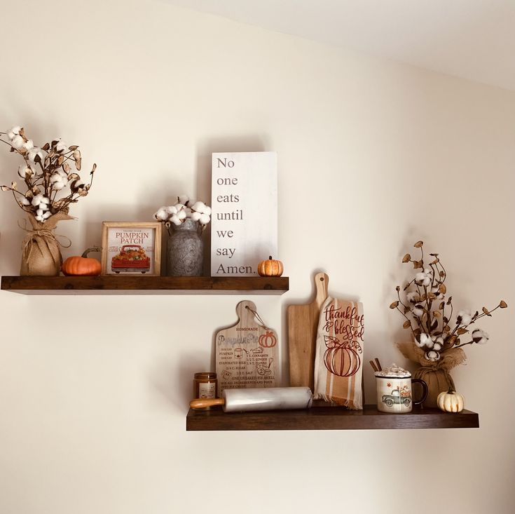 two wooden shelves with decorative items on them