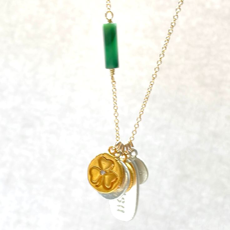 Build your own beautiful Notre Dame charm necklace from an assortment of 24k gold vermeil charms. All charms are hand made and no two are the same. Some charms may have crystals. Charms shown in silver and gold vermeil. How to design your necklace: 1) choose the number of charms you would like 2) enter the names of the charms in the boxes. Please use the following charm descriptions: Shamrock / ND / Number / Irish / Cross If you would like your player number, please just enter the number in the Heirloom Necklaces With Charms, Heirloom Round Charm Necklaces, Good Luck Pendant Jewelry With Dangling Charms, Heirloom Necklace With Round Pendant Charms, Heirloom Charms Round Pendant Necklace, Elegant Good Luck Charms With Dangling Details, Elegant Good Luck Dangling Charms, Yellow Gold Amulet Style Charm Necklaces, Sterling Silver Vintage Charm Necklace For Gift