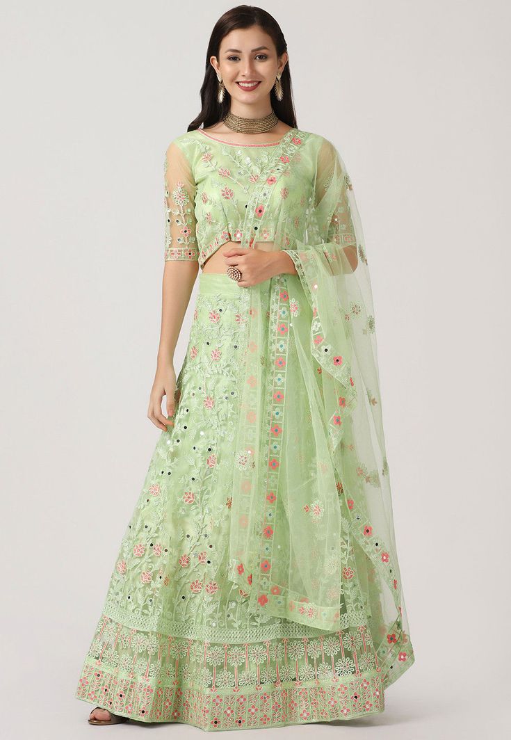 Net Lehenga in Light Green This Attire with Satin Lining is Beautifully Enhanced with Resham, Mirror, Sequins and Patch Border Work Available with a Semi-Stitched Net Choli and a Net Dupatta in Light Green, Crafted in Round Neck and Half Sleeve The Semi-stitched Lehenga Waist and Hips are Customizable from 28 to 38 and 32 to 46 inches respectively and Its Length is 40 inches Do note: Accessories shown in the image are for presentation purposes only.(Slight variation in actual color vs. image is A Line Lehenga, Heavy Lehenga, Lehenga Fabric, Green Lehenga, Net Lehenga, Lehenga Blouse, Half Sleeve Blouse, Utsav Fashion, Net Fabric