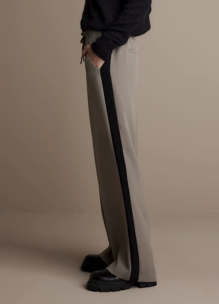 A modern take on the tuxedo pant Wide Leg Bottoms With Contrast Trim For Work, Spring Wide Leg Bottoms With Contrast Trim, Full Length Pants With Side Stripes, Modern Ankle-length Evening Pants, Ankle-length Pants With Elastic Side Panels For Work, Tuxedo Style Tailored Pants For Night Out, Workwear Bottoms With Contrast Trim, Wide Leg Pants With Elastic Side Panels For Work, Modern Formal Long Pants