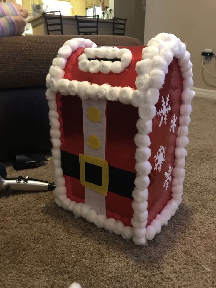 an inflatable santa clause box sitting on the floor