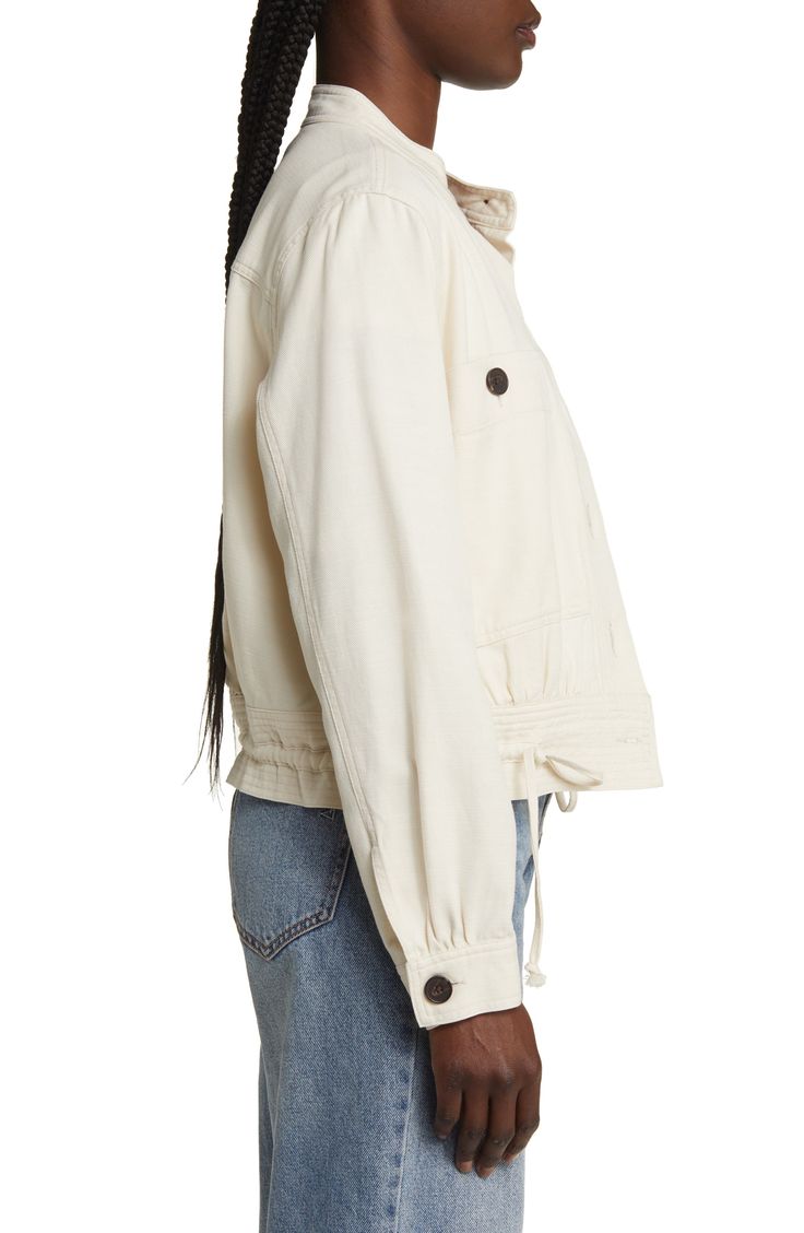 Oversized patch pockets lend utility-inspired style to this sustainably made cotton-blend jacket featuring a button-up closure and drawstring hem. 22" length (size Medium) Front button closure Blade collar Chest button-patch pocket Drawstring waist 53% cotton, 47% Tencel® lyocell Tencel lyocell is a sustainably produced fiber made with closed-loop processing Machine wash, tumble dry Imported Beige Cotton Utility Jacket With Multiple Pockets, Spring Cotton Shacket With Cargo Pockets, Spring Beige Utility Jacket With Cargo Pockets, Beige Utility Jacket With Cargo Pockets For Spring, Spring Cotton Utility Jacket With Multiple Pockets, Beige Cotton Outerwear With Cargo Pockets, Spring Cotton Shacket With Side Pockets, Trendy Cotton Utility Jacket With Cargo Pockets, Casual Cream Utility Jacket With Pockets