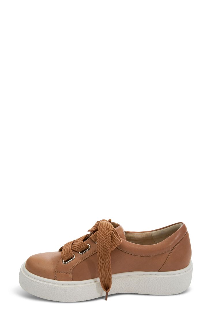 Add a classic athleisure element to your look with this well-cushioned sneaker lifted by a just-right platform. 1 1/2" platform Lace-up style; side zip closure Removable, cushioned insole Leather upper and lining/rubber sole Imported Sporty Brown Platform Sneakers, Sporty Platform Sneakers For Walking, Casual Sneakers With Lug Sole For Walking, Casual Brown Sneakers With Lug Sole, Casual Platform Sneakers For Walking, Casual Lace-up Platform Sneakers For Walking, Casual Low-top Platform Sneakers With Removable Insole, Casual Brown Platform Wedge Sneakers, Casual Platform Sneakers With Rubber Sole For Walking